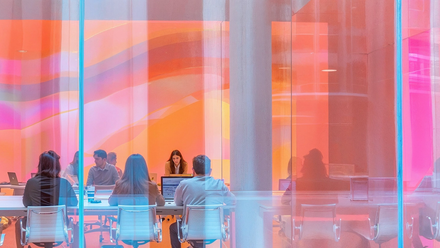 Modern Office Meeting with Colorful Glass Panes (1).png
